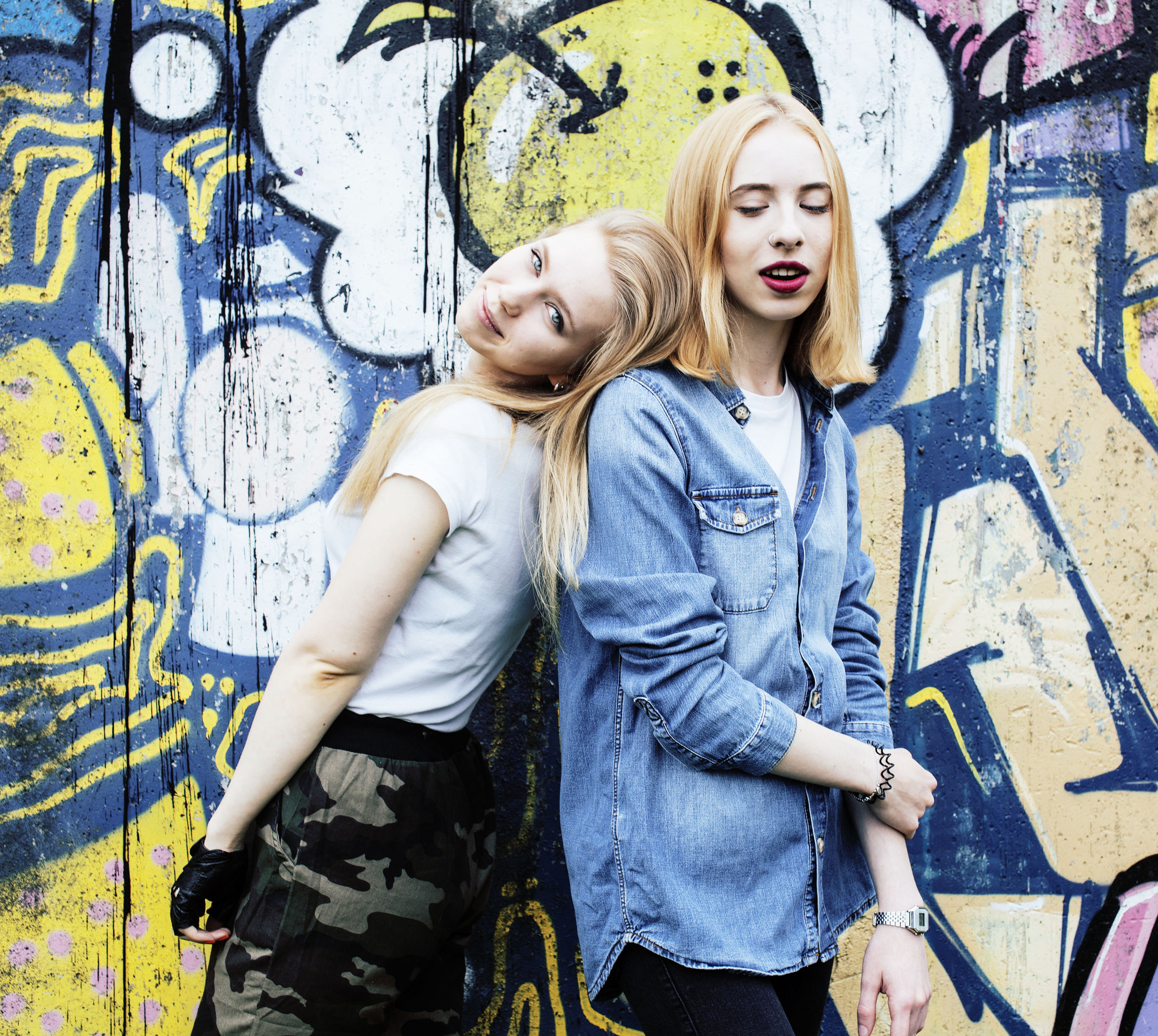 65386366 - two blonde real teenage girl hanging out at summer together best friends, lifestyle people concept close up